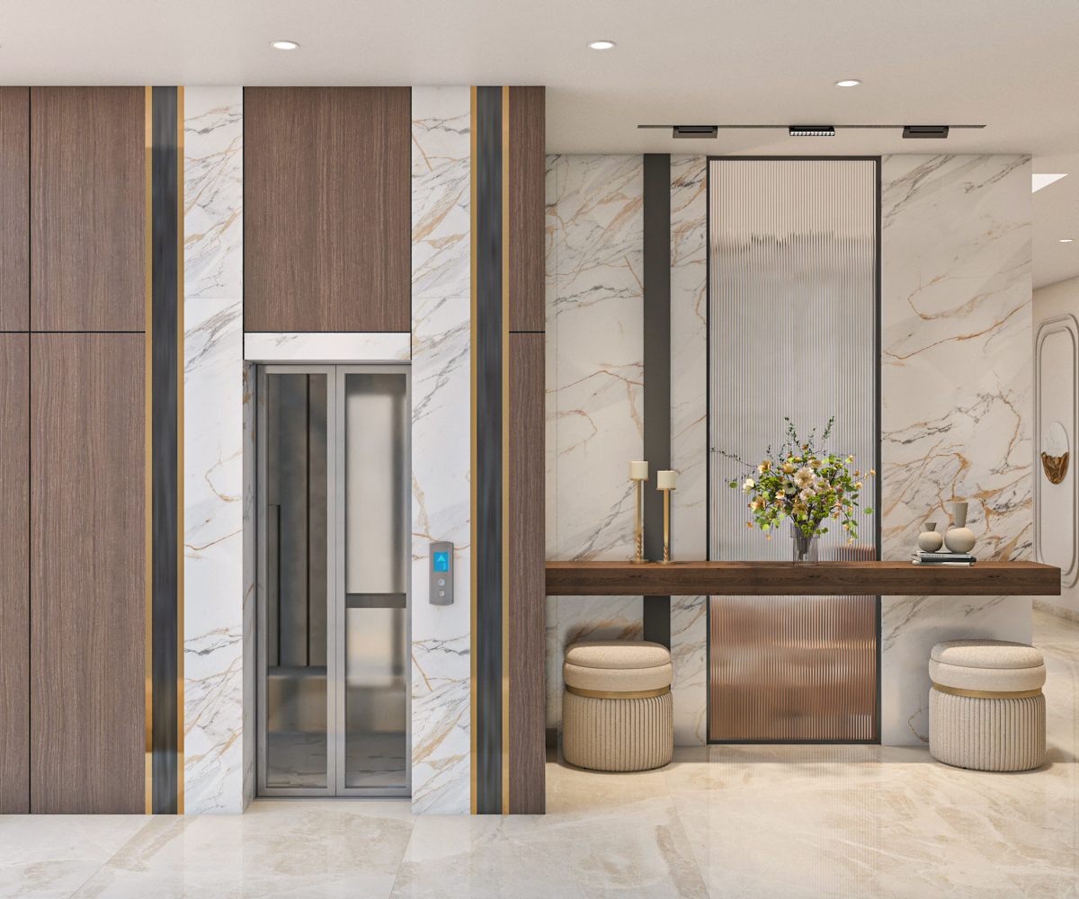 Entrance foyer with marble and walnut wall paneling, brass inlay, and reeded glass console
